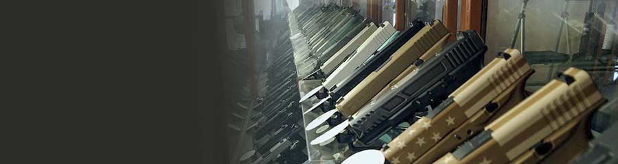 line of pistols in a gun case