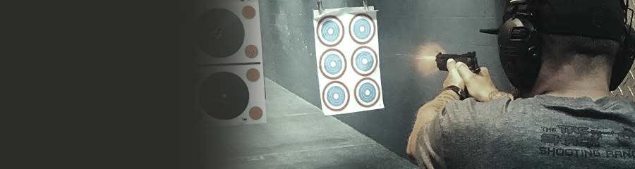 man shooting a pistol at a paper target with a tac shack firearm webinar giveaway t-shirt