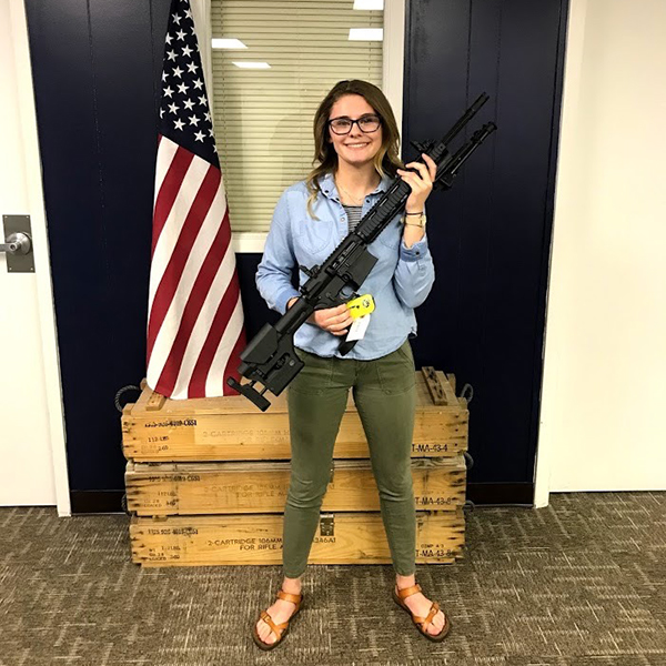 woman with rifle for webinar giveaway